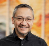 Claudio Mora, director of Catholic programs for Marriage Every Day, smiling
